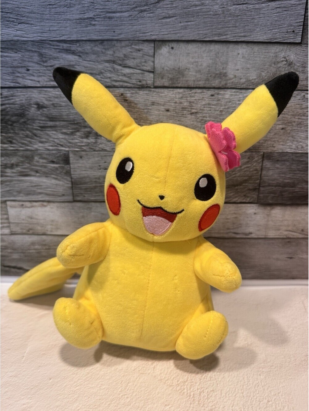 Jazzwares Pokemon Pikachu 8" Plush Toy Yellow with Pink Flower